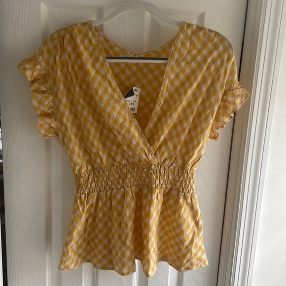 Tops - Blouse with yellow gingham pattern. Ruffled sleeves. Cinched waist. Never worn.